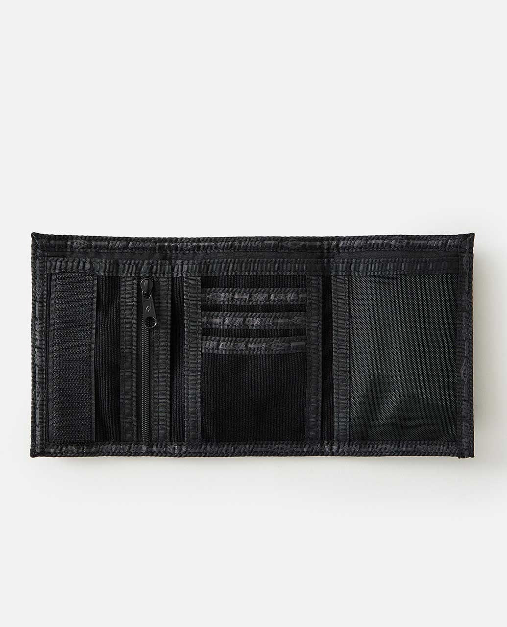 A black Rip Curl Archive Cord Surf Wallet, shown open to reveal its well-organized interior with multiple compartments and pockets for organizing cards, cash, and other essentials. The wallet includes an ID window, numerous card slots, a zippered coin pocket, a spacious compartment for bills, and a secure velcro closure.