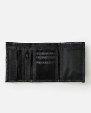 A black Rip Curl Archive Cord Surf Wallet, shown open to reveal its well-organized interior with multiple compartments and pockets for organizing cards, cash, and other essentials. The wallet includes an ID window, numerous card slots, a zippered coin pocket, a spacious compartment for bills, and a secure velcro closure.