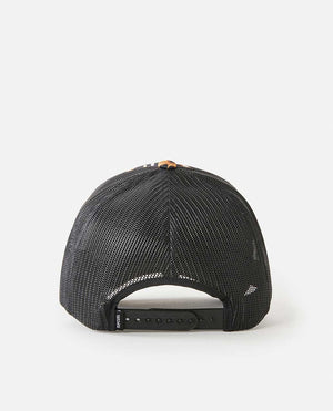 The Rip Curl La Isla Trucker hat in black is shown from behind, highlighting its mesh back, adjustable snapback strap, and a small label on the left side of the strap against a white background.