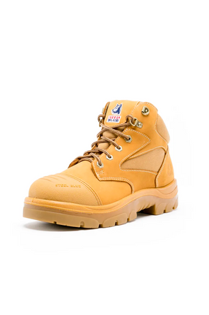The Steel Blue Parkes Zip Scuff Cap Boot, shown against a white background, is a single tan-colored construction boot with a thick rubber sole and lace-up front. This boot features reinforced stitching, metal eyelets, and "Steel Blue" engraved on the safety steel toe. It also boasts anti-static properties and has a logo patch on the tongue.