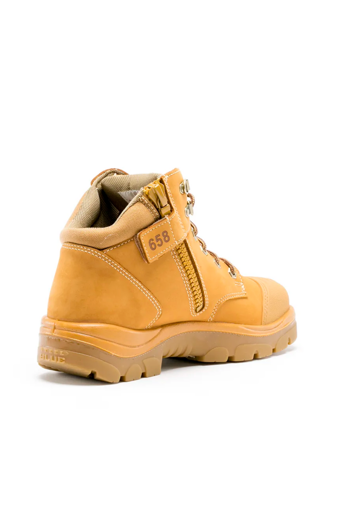The Steel Blue Parkes Zip Scuff Cap Boot is a tan-colored work boot featuring a rugged sole, lace-up front, side zipper, and a small fabric tag with the number "658." It includes a padded ankle collar, safety steel toe, heat-resistant TPU outsole, and is built for durability and comfort.
