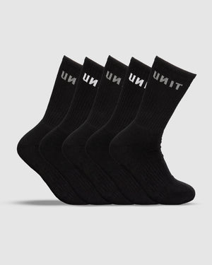 Five UNIT Respond Bamboo 5 Pack Socks line up against a white background. Each black crew sock displays "UNIT" in white near the top, providing an anti-bacterial benefit for lasting freshness.