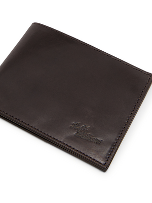 The RM Williams Singleton Bi-fold Wallet is crafted from premium dark brown calf leather with neat stitching, RFID protection, and a subtle embossed logo in the bottom right corner, displayed on a white background.