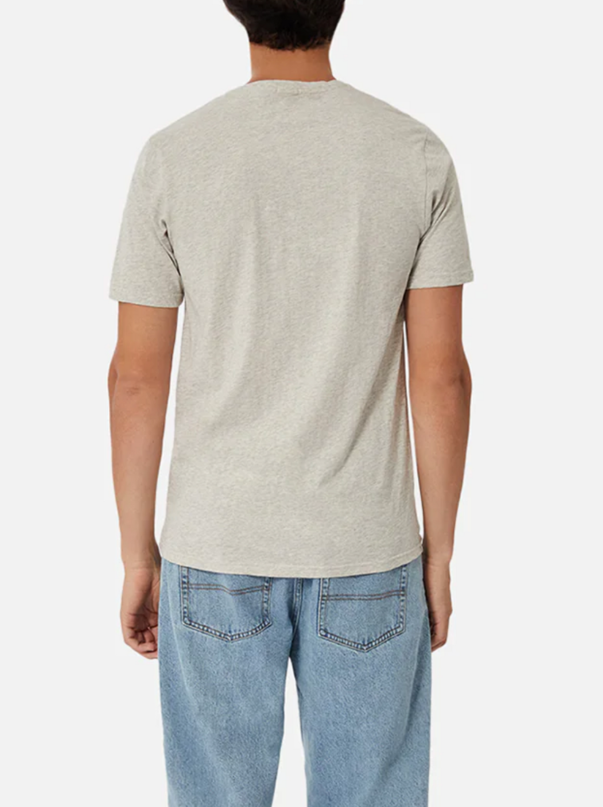 A person with short dark hair is wearing the Industrie The Basic Crew Tee in light gray and blue jeans. They're standing with their back to the camera against a plain white background—an everyday staple look that never goes out of style.