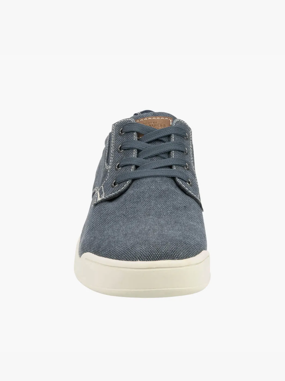 Front view of the Florsheim Kore Tour Canvas Lace Sneaker, showcasing blue denim-like fabric, white stitching, blue laces, and a white rubber sole. Made with breathable mesh for comfort and inspired by the original Kore Tour design.