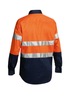 The Bisley Taped Hi Vis Closed Front Drill Shirt features a bright orange, long-sleeved cotton drill fabric with navy blue accents on the lower sleeves and hem. It includes horizontal reflective tape stripes on the chest and arms for enhanced visibility and safety.