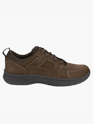 The Florsheim Mac Mocc Ox Lace is a brown low-top athletic shoe with a lace-up closure, leather upper, and black cushioned sole featuring KORE technology. Its decorative stitching, perforations, and Smartscent footbed enhance comfort and design.