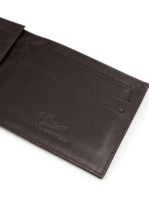 Open brown calf leather RM Williams Singleton Bi-fold Wallet displaying card slots and embossed “R. M. Williams Made in Australia” text inside.