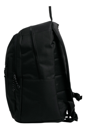 Here’s a side view of the Billabong Norfolk Backpack in black, showcasing its multiple compartments and zippers. Constructed from recycled polyester, the bag boasts padded shoulder straps, a top handle, and convenient side pockets. The overall design is sleek and functional.