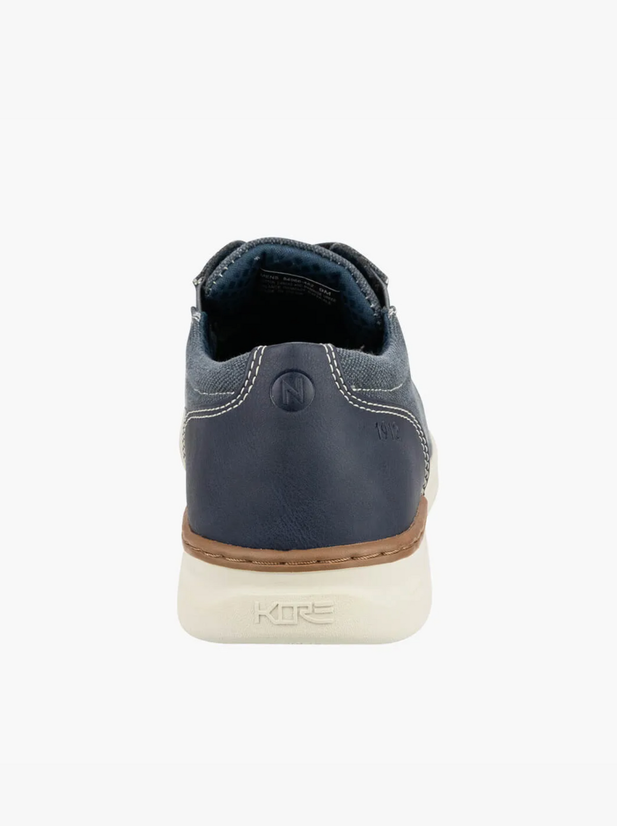 Back view of the Florsheim Kore Tour Canvas Lace Sneaker in blue, featuring white stitching, tan midsole, white sole with "KORE" branding, low-top design, visible heel padding, and breathable mesh for comfort.