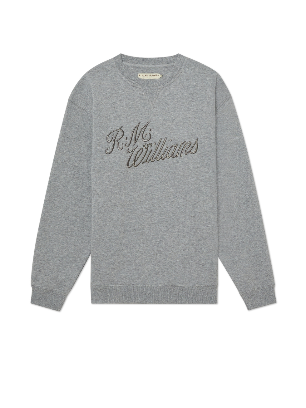 The RM Williams R.M.W Script Crew Neck is a grey cotton blend jumper with an embroidered "R.M. Williams" cursive logo on the front, featuring ribbed cuffs, collar, and hem for a classic finish.