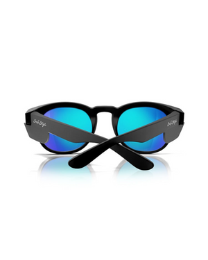 The SafeStyle Cruisers sunglasses feature a matte black frame with blue-tinted, polarised mirrored lenses. Offering UV400 protection and shatterproof polycarbonate, they create a striking contrast against the white background as their stylish design reflects light beautifully.
