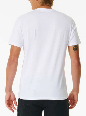 A person with medium-length hair is seen from behind, wearing a Rip Curl Brand Icon Tee in plain white with black pants. Made of 100% cotton for comfort, the tee contrasts with their small right-arm tattoo against its plain background.