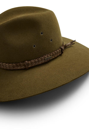 A close-up of the Akubra Riverina: an olive green felt hat with a broad brim, braided brown band, and metal eyelets—ideal for stylish sun protection—shown against a white background.