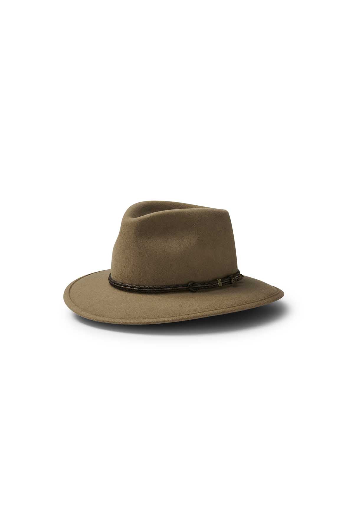 The Akubra Traveller is a brown hat made from pliable felt for comfort, featuring a wide brim and dark braided band. Its practical design stands out against a plain white background.