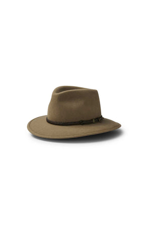 The Akubra Traveller is a brown hat made from pliable felt for comfort, featuring a wide brim and dark braided band. Its practical design stands out against a plain white background.