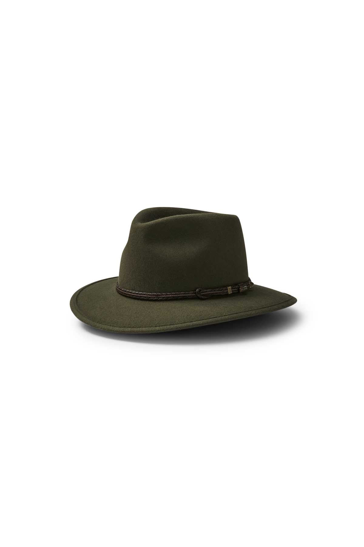 The Akubra Traveller is a dark green hat with a wide brim and black leather band, crafted from felt for adventurers, shown on a plain white background.