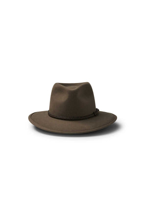 The Akubra Traveller is a brown, wide-brimmed felt hat featuring a pinched crown and braided band, shown on a white background with a soft shadow.