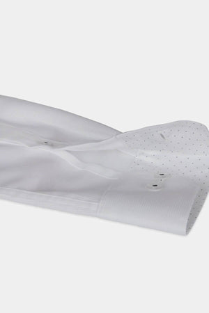 Close-up of the cuff and sleeve of the Abelard Bedford Dobby Slim Fit Shirt, showcasing small dotted patterns and two white buttons on the cuff, laid flat against a light background.