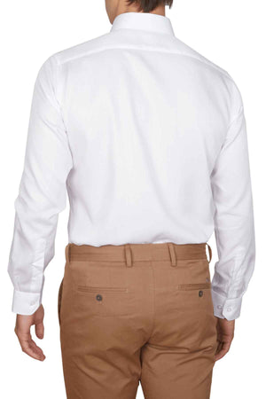 A person is seen from behind wearing an Abelard Non Iron Cotton Twill Super Slim Fit Shirt in white, crafted from Egyptian cotton, paired with beige trousers. The shirt is neatly tucked in, highlighting the upper back and arms.