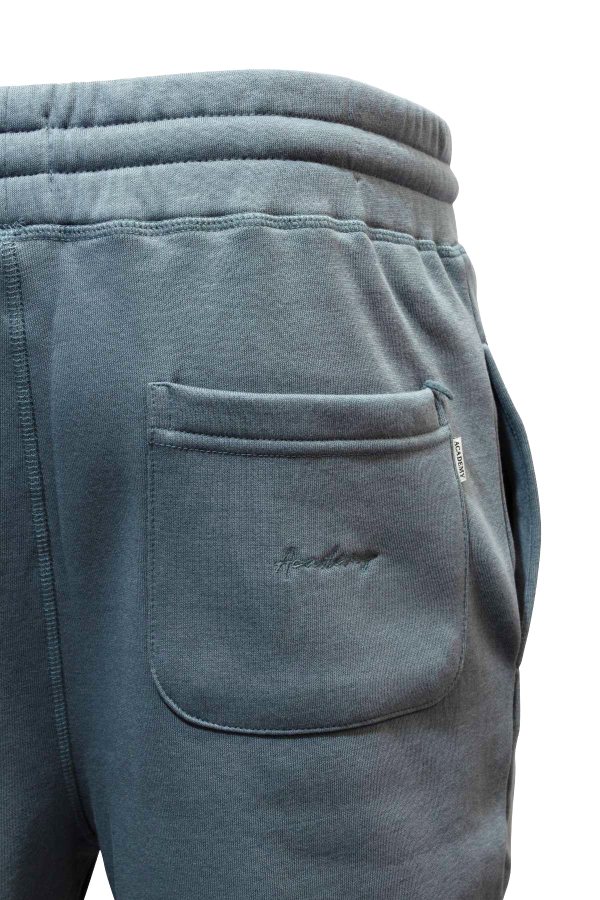 Close-up of the Academy Brand Sweat Pant’s back pocket with ribbed waistband, visible seams, and a fabric tag. Check our size guide for your ideal waist measurement.
