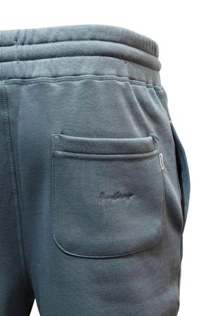 Close-up of the Academy Brand Sweat Pant’s back pocket with ribbed waistband, visible seams, and a fabric tag. Check our size guide for your ideal waist measurement.