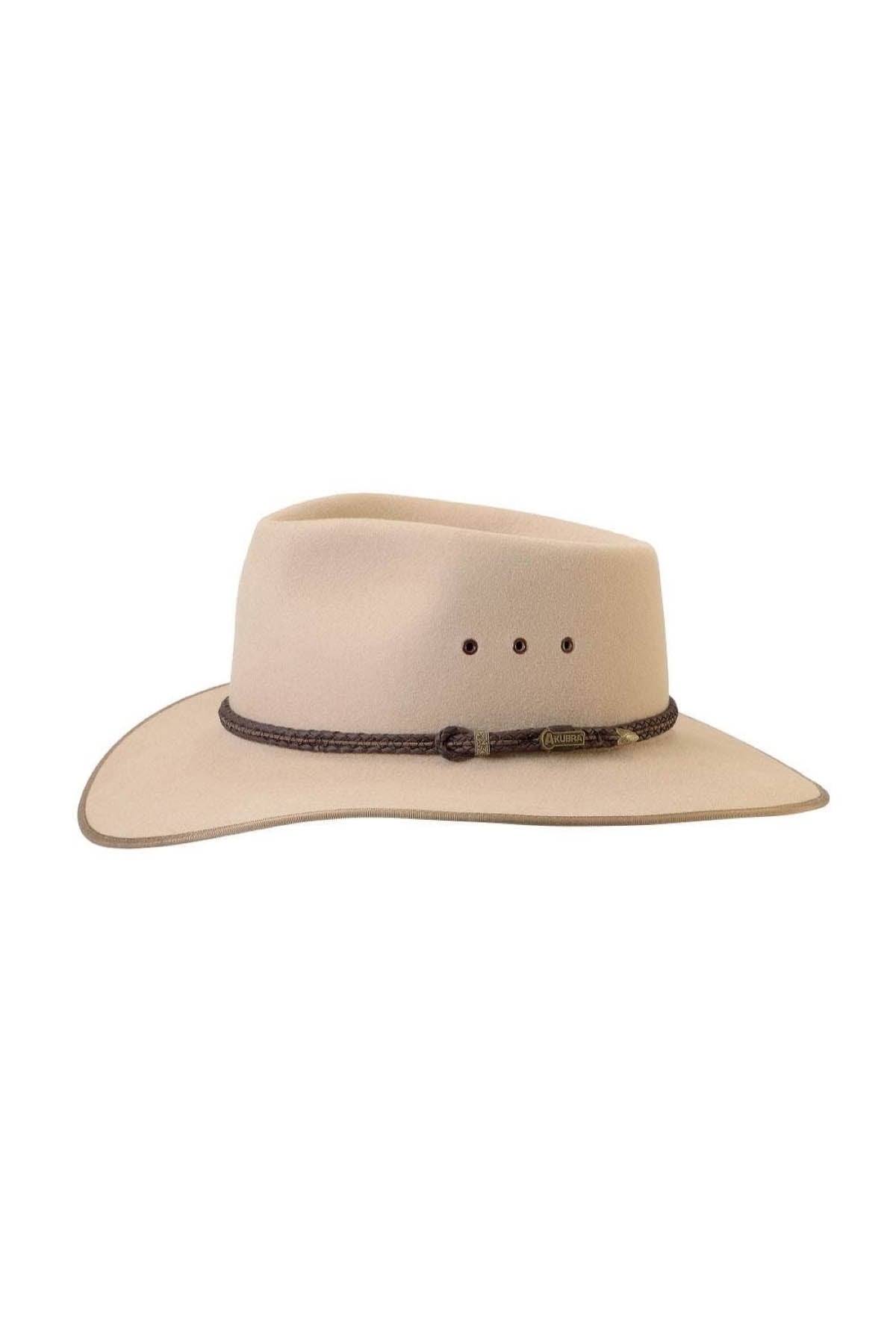 The Akubra Cattleman hat in beige features a dark brown braided band, small logo tag, and embodies Australian identity. It has three small ventilation holes on the side of the crown for style and practicality.