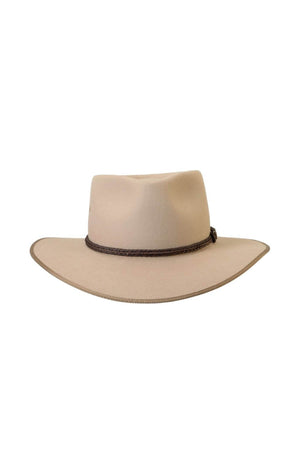The Akubra Cattleman is a wide-brimmed beige felt hat with a brown braided band around the crown, capturing a classic Australian identity and reminiscent of traditional Akubra style.