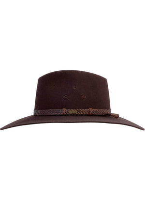 The Akubra Riverina is a brown outback hat made from rabbit fur felt, featuring a wide brim for sun protection, a braided band for style, and side crown ventilation holes for comfort.