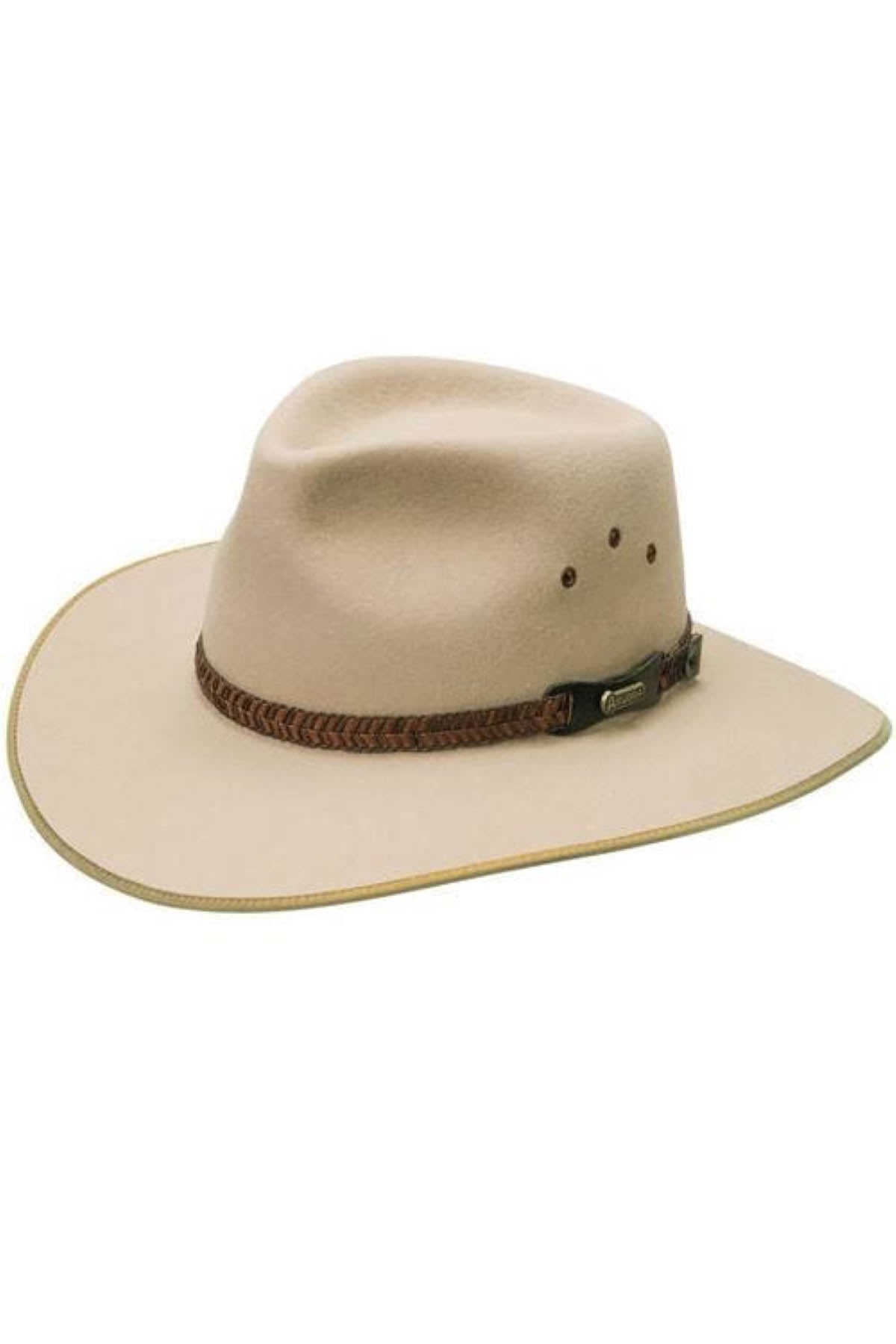 The Akubra Tablelands is a beige hat with an Akubra-style featuring a broad brim, slightly creased crown, and a brown braided leather band. It includes three ventilation holes on each side for breathability.
