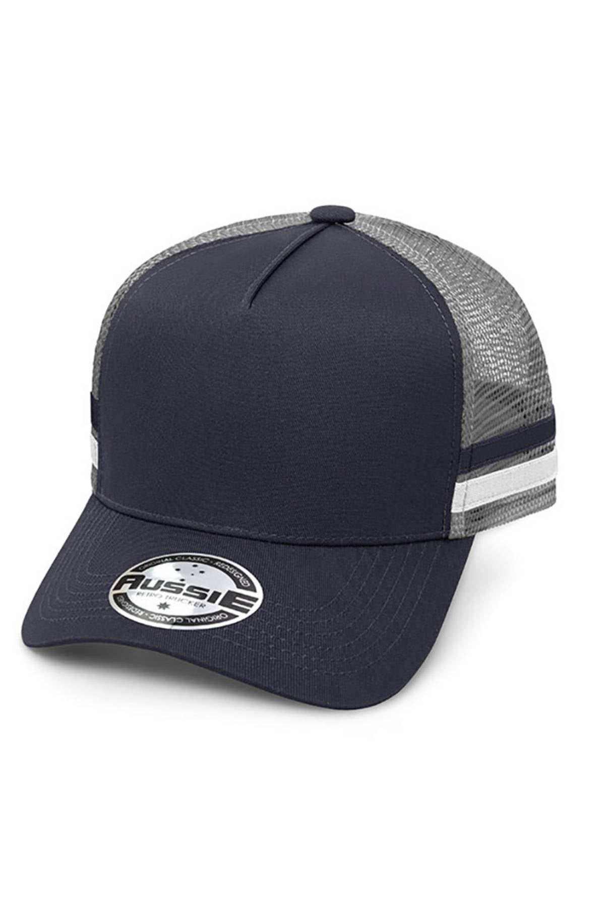 The Aussie A Frame Striped Trucker Cap features a navy blue and gray design, curved brim, contrast mesh back, white and gray side stripes, adjustable strap, and a round "Russell" sticker on the bill.