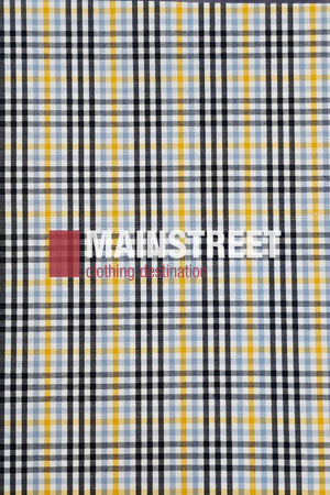 A checkered fabric pattern with black, white, blue, and yellow stripes features "MAINSTREET clothing destination" in bold white and red text, evoking the classic style of the Bisley Countryman Short Sleeve Shirt.