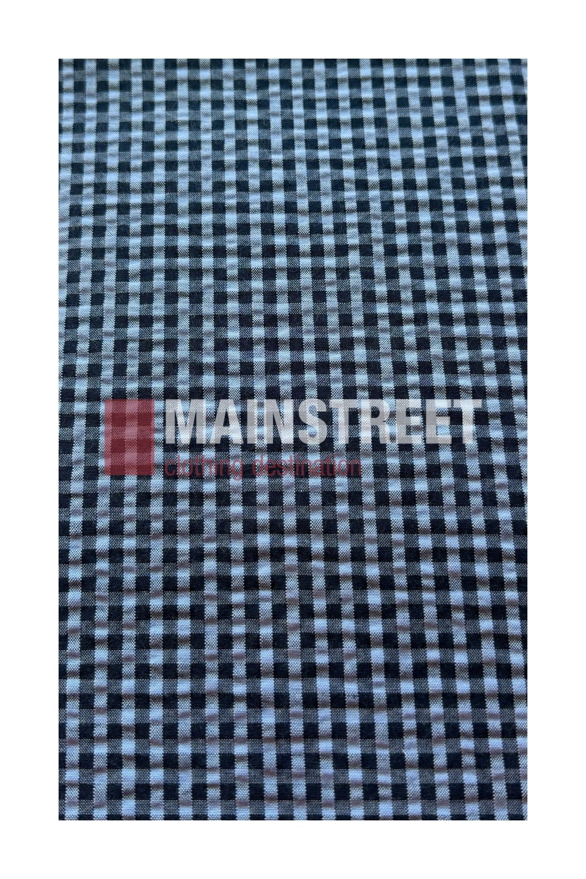 Close-up of black and white gingham check fabric with small, evenly spaced checks, reminiscent of the classic style found in a Bisley Countryman Seersucker Short Sleeve Shirt. The MAINSTREET watermark appears across the center of the image.