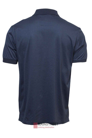 The Back Bay Mercerised Cotton Jacquard Polo is a men's short-sleeved, navy blue shirt with a collar and ribbed sleeve edges, shown from the back. The Mainstreet logo appears subtly near the bottom of this premium design.