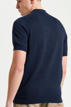 A man wearing a Ben Sherman Signature Polo.
