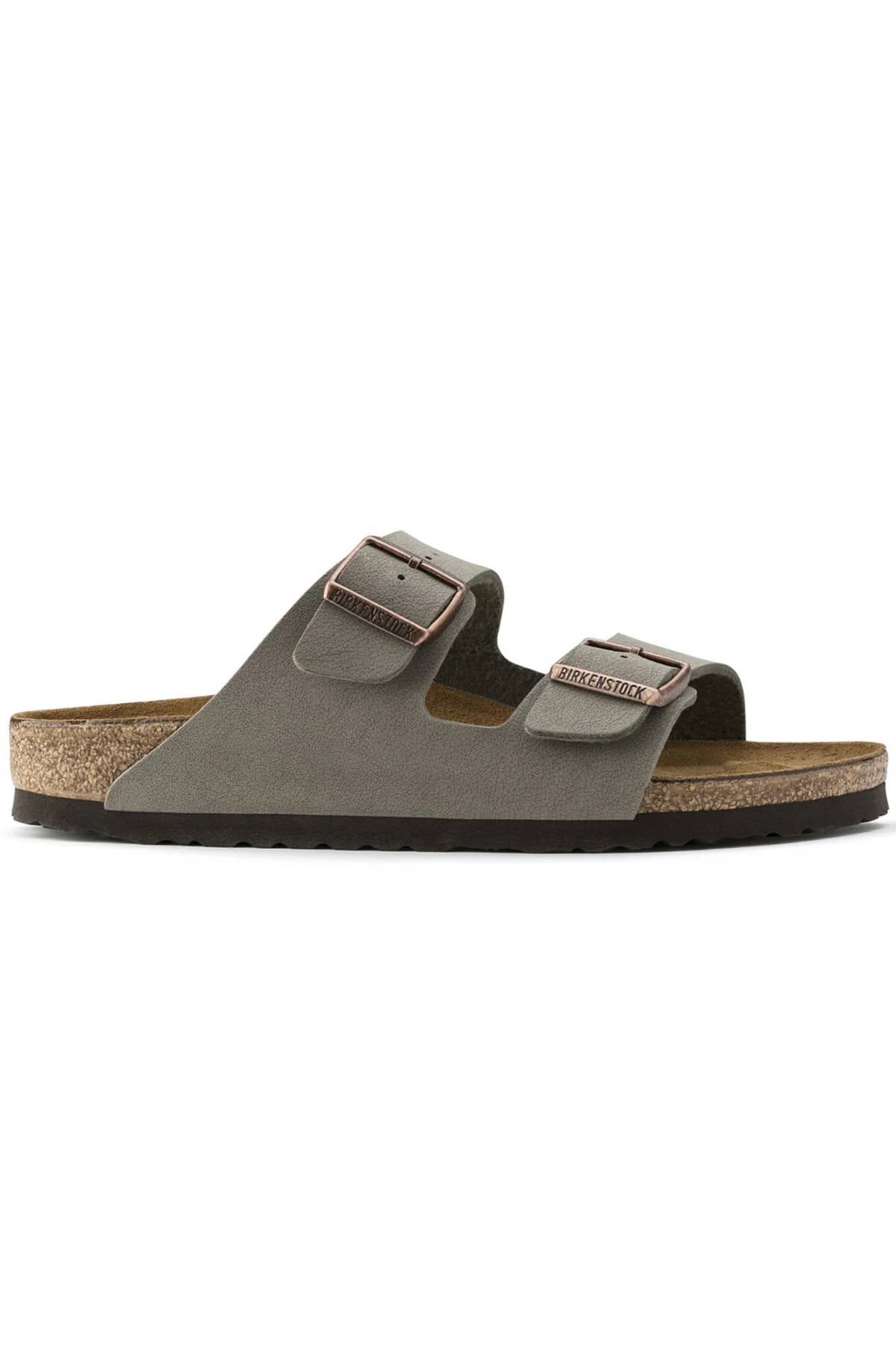 A single Birkenstock Arizona sandal in gray features two adjustable buckles, a contoured cork footbed, and a black rubber sole, displayed in a side profile view.