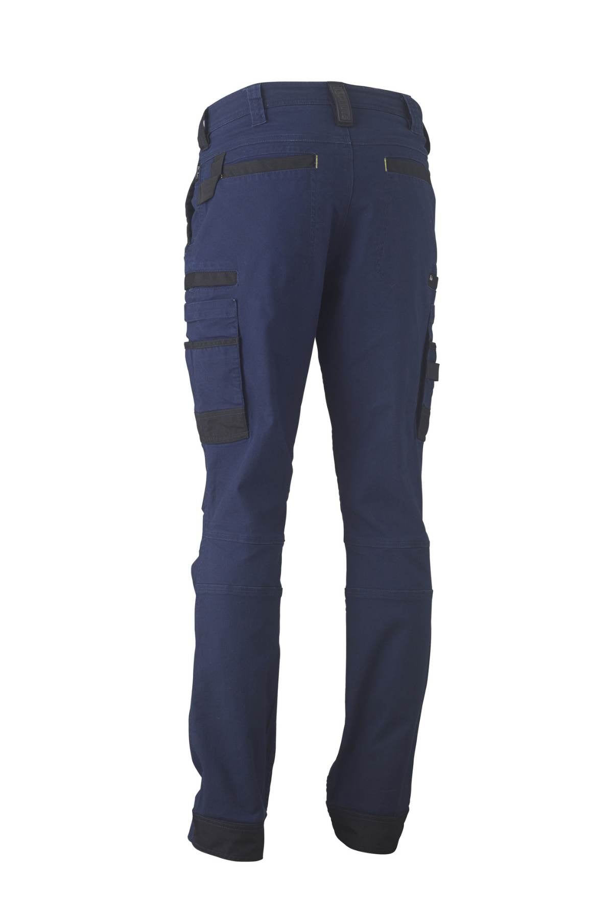 The Bisley Flex & Move Stretch Utility Cargo Pant is designed in blue with Cordura highlights, boasting multiple cargo pockets along the sides and back. These work pants come with a black waistband and knee reinforcements, showcased against a plain white background.