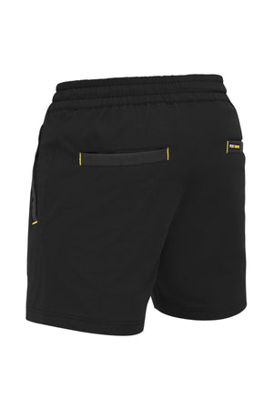 Experience the Bisley Flex & Move 4 Way Stretch Elastic Waist Short in black, showcasing its rear view with an elastic waistband and distinctive yellow accent stitching. This design includes two back pockets, one adorned with a small label nearby. Crafted for ultimate comfort, the shorts feature a 4-way stretch fabric that offers lightweight ease of movement, making them perfect for sports or casual wear.