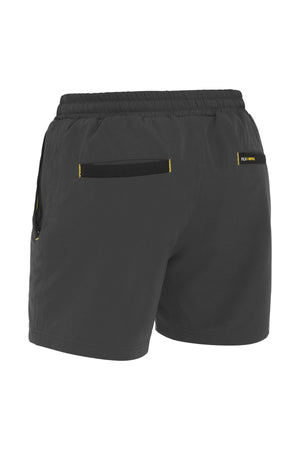 The Bisley Flex & Move 4 Way Stretch Elastic Waist Short in dark gray features a comfortable stretch waistband, has Cordura fabric for added durability, and includes stylish black and yellow accents on the back pockets and side areas. These shorts are designed with 4-way stretch, making them perfect for both sports and casual wear.