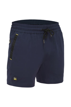 The Bisley Flex & Move 4 Way Stretch Elastic Waist Short in navy blue features an elastic waistband and a black drawstring. These athletic shorts are crafted from 4-way stretch Cordura® fabric and include side pockets with black striped accents, along with a small "Flex Move" logo tag on the left leg.