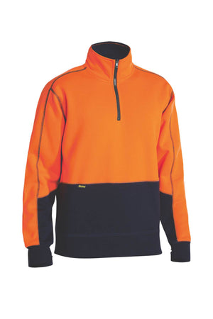 The Bisley Hi Vis 1/4 Zip Pullover Fleece showcases a high-visibility orange and black design, featuring a 1/4 zip collar. Crafted from durable polyester fleece, this pullover has a bright orange upper section paired with black lower sections and cuffs. It is enhanced with visible stitching and includes a small logo tag on the side to offer both style and safety.