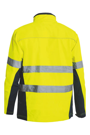 The Bisley Hi Vis Soft Shell Taped Jacket is a high-visibility yellow and black safety garment featuring reflective silver stripes and taping across the back and arms, specifically designed for enhanced visibility in low-light conditions. This comfortable jacket is also water-resistant, offering reliable protection against the elements.