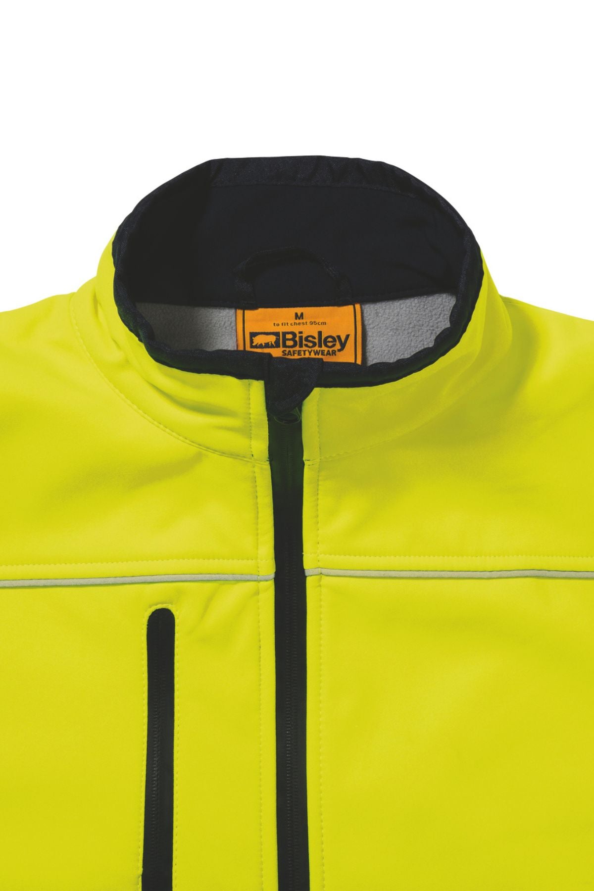 Close-up of the Bisley Hi Vis Soft Shell Taped Jacket, featuring a bright yellow, high-visibility design with a water-resistant finish. It includes a black zipper and collar, with an interior tag displaying "Bisley" in black text on an orange background. The comfortable jacket is enhanced with reflective taping and includes a vertical black pocket zip on the left side.