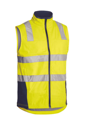 The Bisley Hi Vis Soft Shell Taped Vest is a sleeveless vest featuring a yellow front, a gray reflective taped hoop pattern, and showerproof fabric. This safety vest includes a zippered front and a stand-up collar, providing excellent visibility and protection in any weather condition.
