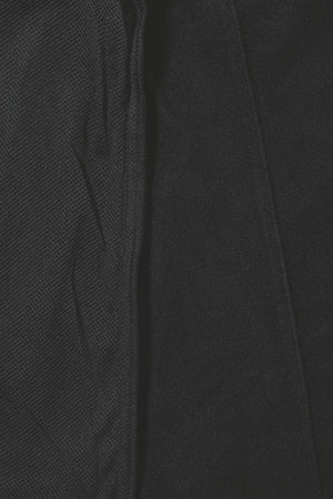 Close-up of the Bisley Soft Shell Jacket, showcasing a black textured fabric with contrasting surface texturesāa mesh pattern on the left and smoother material on the rightāreminiscent of its showerproof design, enhanced by reflective piping.