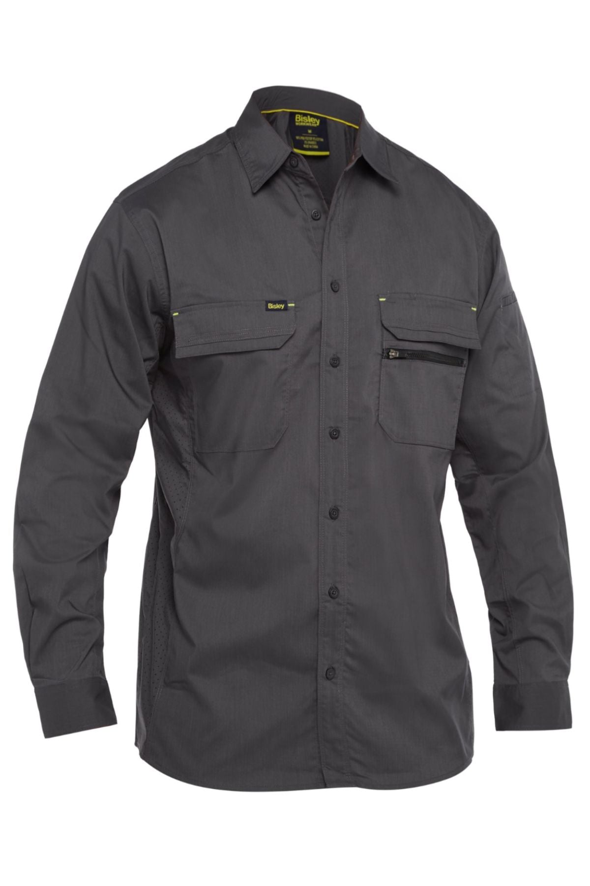 The Bisley X Airflow Stretch Ripstop Shirt is a long-sleeved, dark gray work shirt with two chest pockets (one zippered) and subtle yellow stitching accents. Lightweight and shown on a white background.