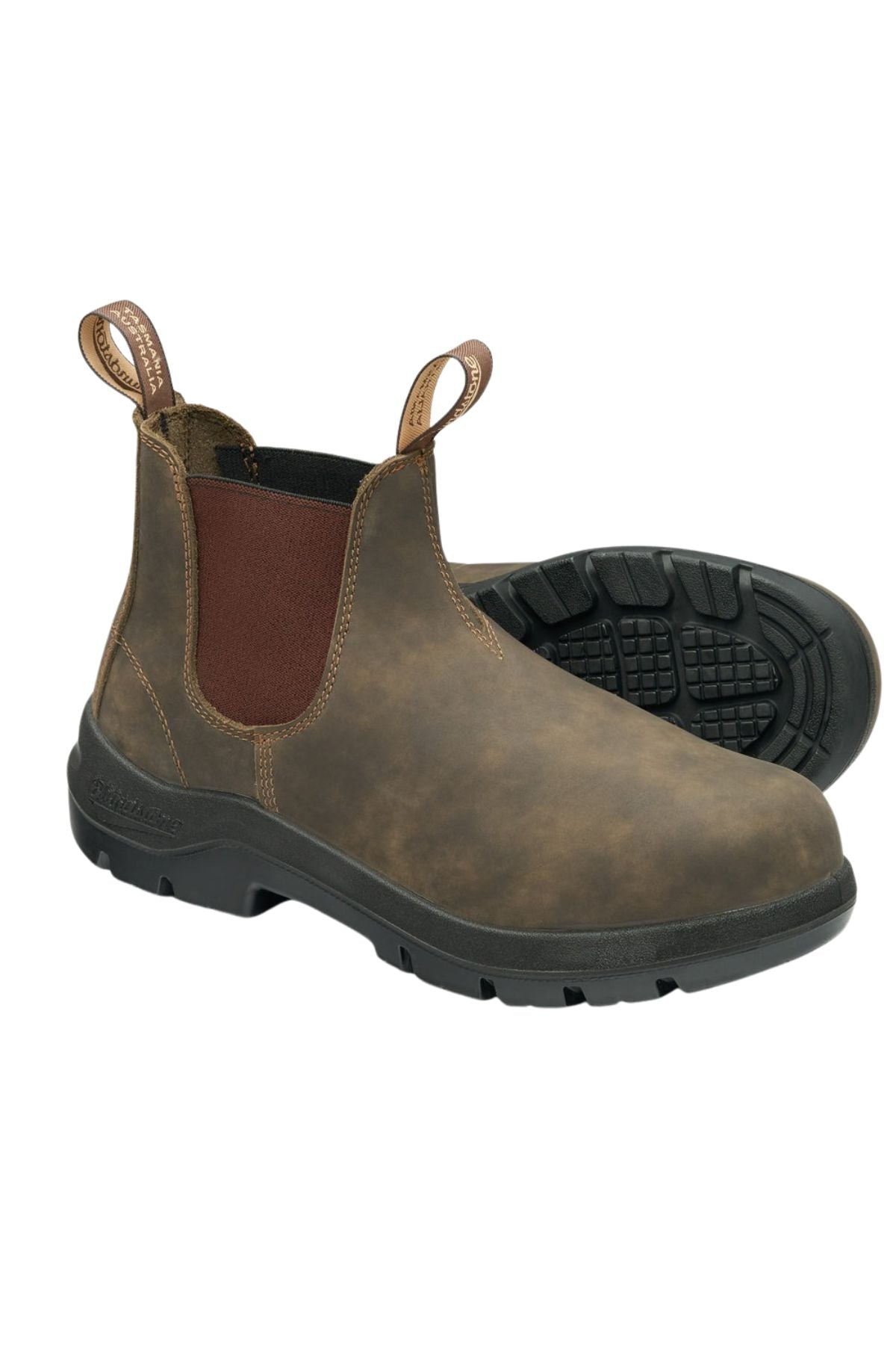 A pair of Blundstone 730 WorkLife Series Non Safety Boots in brown leather, featuring black rubber soles, elastic side panels, and front and back pull tabs. One boot stands upright; the other is on its side showing the tread.