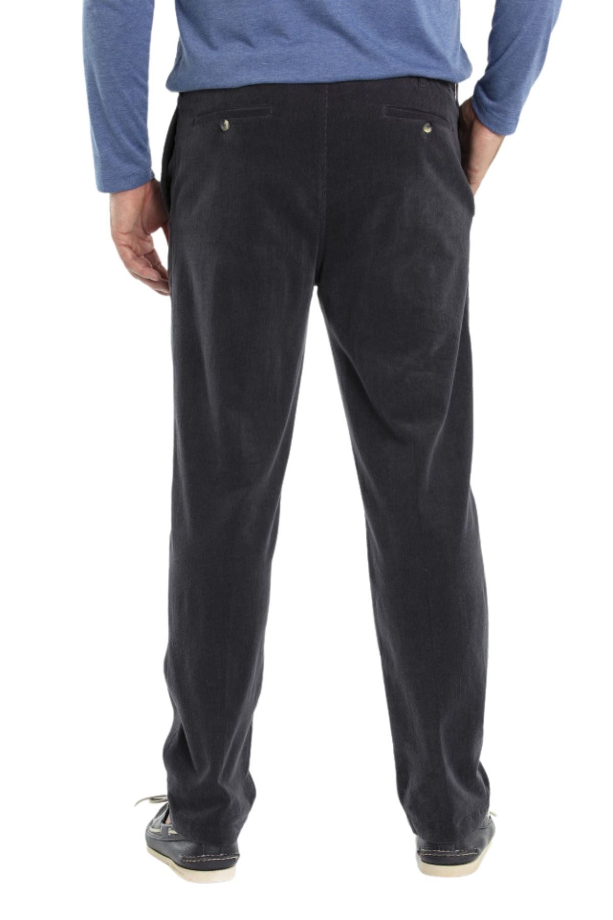 A person is seen from behind wearing the Breakaway Woodbury Pull On Pant—dark gray relaxed fit with an elastic waist and buttoned back pockets—paired with a blue long-sleeve shirt and casual shoes.