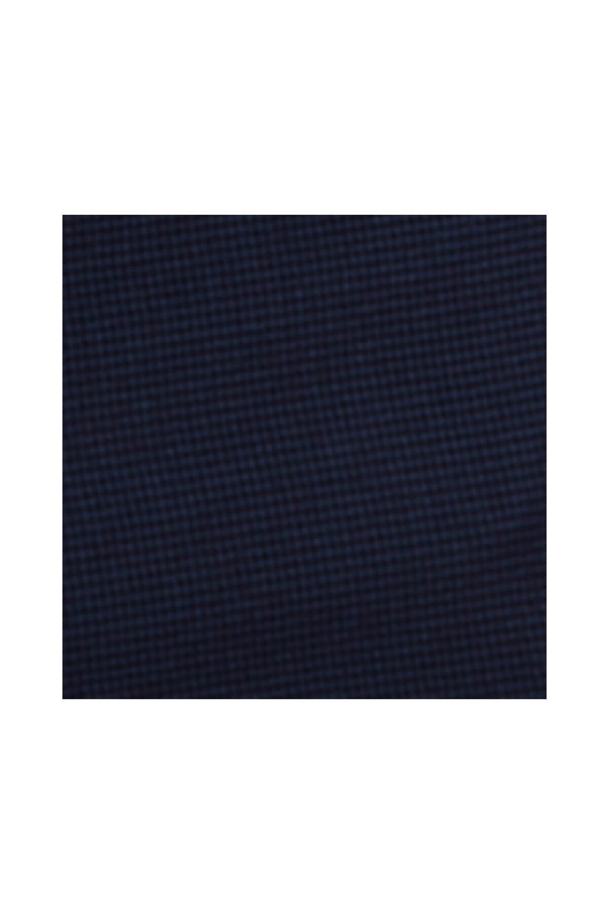 Explore the Bruton Jesse Trouser, a slim-fit suit pant in dark blue textured fabric with a fine check and subtle grid pattern, ideal for formal occasions.