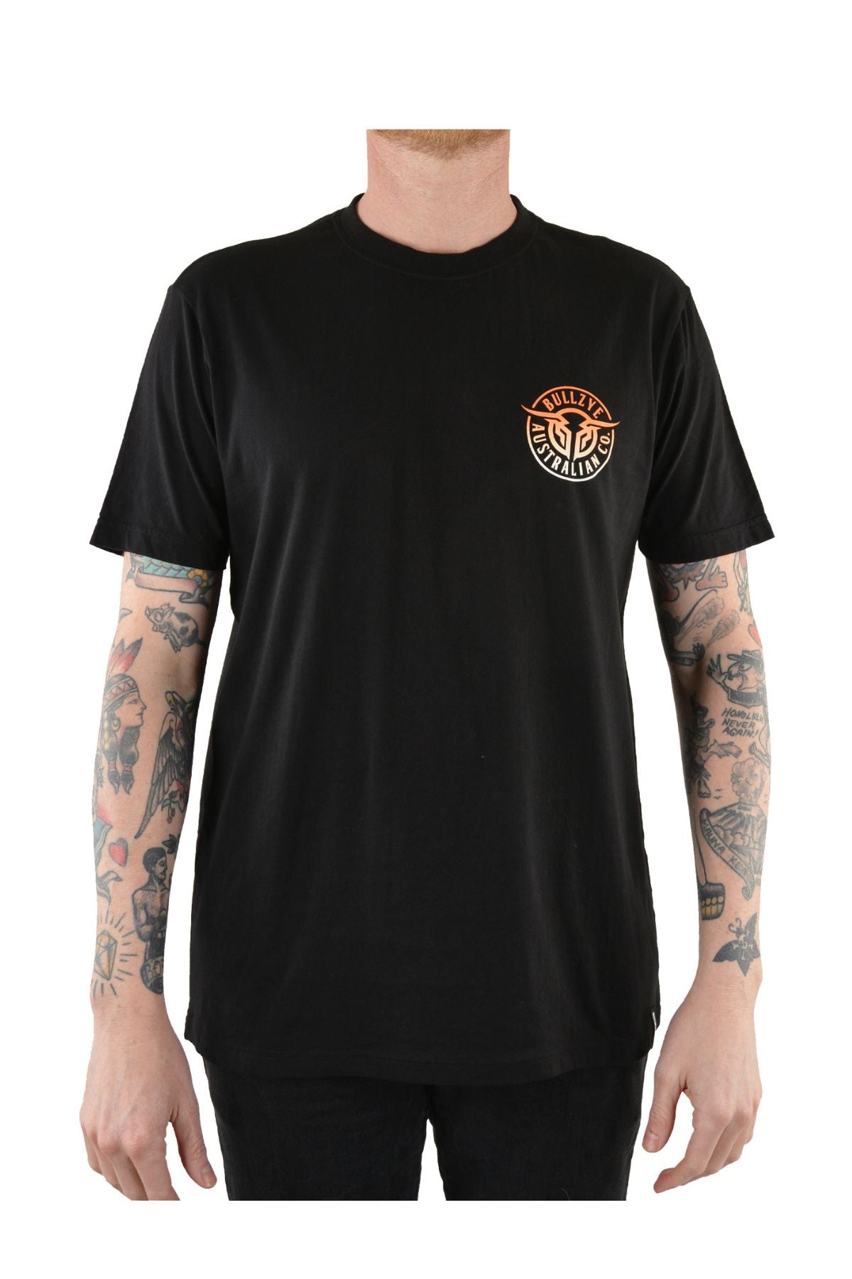 Wearing the Bullzye Bullring Tee—a black cotton tee featuring a small orange and white "Built Australia" logo on the left chest—a tattooed individual stands against a plain white background.
